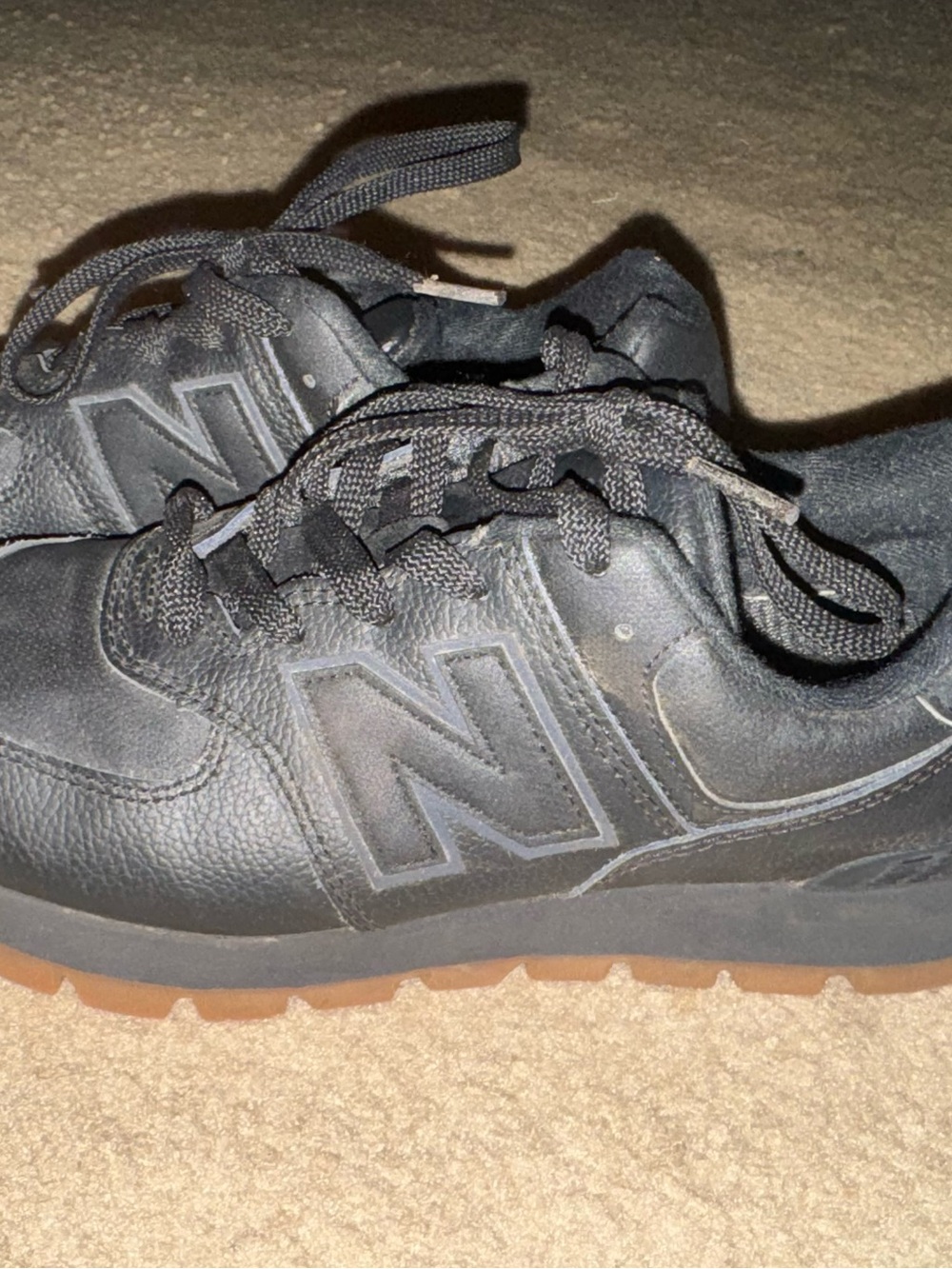 New Balance Women’s Black Leather Sneakers with Gum Sole